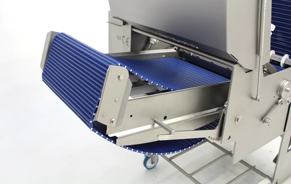 Infeed and exit conveyor are open designs with modular belting to ensure easy to breakdown for sanitation